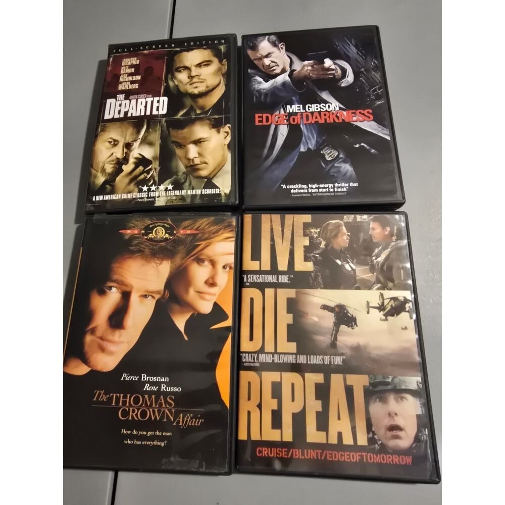 4 DVDS Titles in Description‎